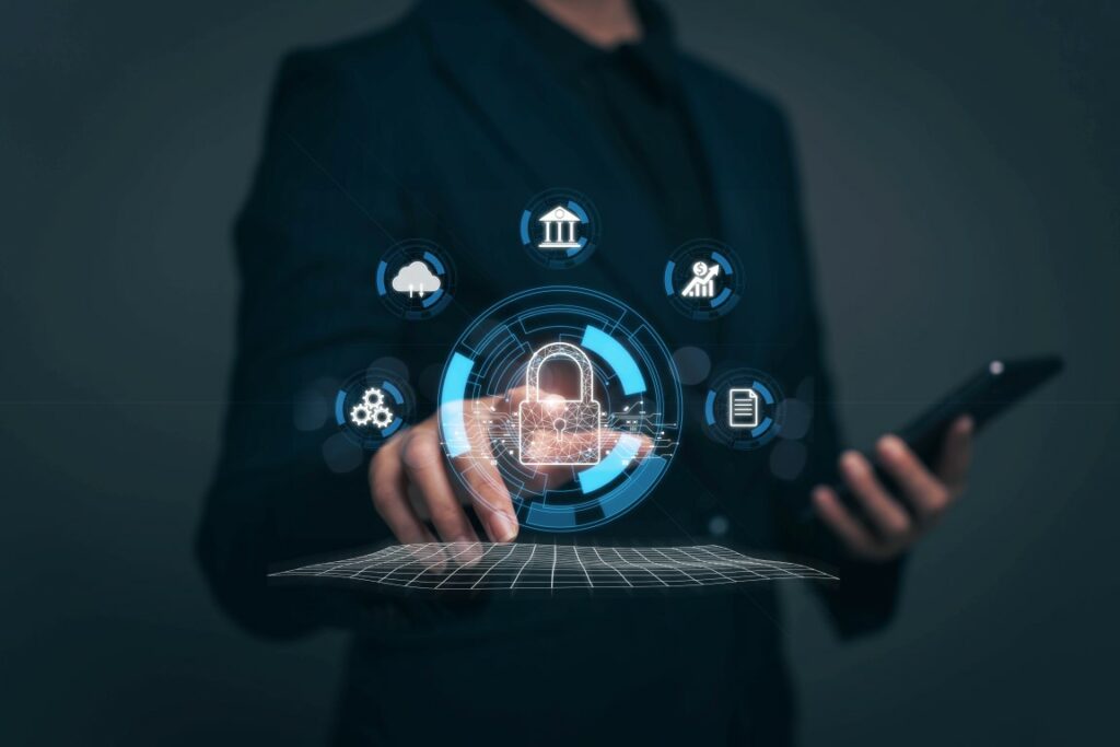 Businessman finger touching padlock icon.cybersecurity protection concept.innovative digital crime prevention technology.financial data protection financial transaction security