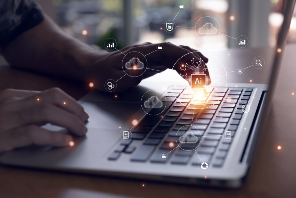 Selective focus at men hand that typing on keyboard to enter command for ai that can access to cloud computing unit that can access to business and customer database to create marketing campaign.