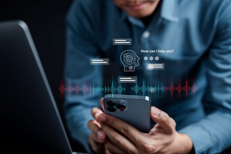 Businessman using chat bot in smartphone intelligence ai.chat bot with ai artificial intelligence, developed by openai generate. futuristic technology, robot in online system.